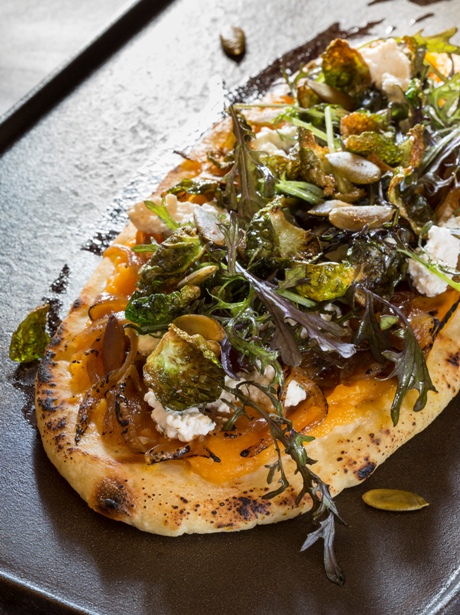 Butternut Squash Flat Bread with Mustard Greens and Fried Brussels Sprout Leaves at Crossroads by Chef Tal Ronnen, Executive Chef Scot Jones & Executive Pastry Chef Serafina Magnussen.